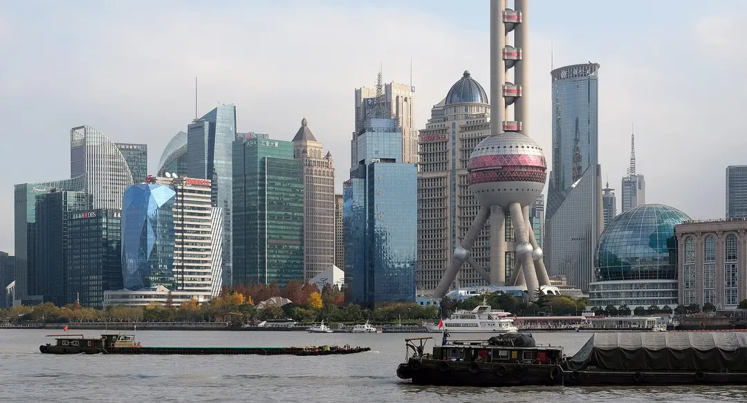 The Lujiazui towers and the Oriental Pearl Tower across the Huangpu River, seen from the Bund