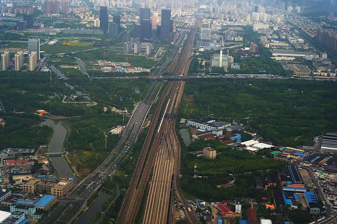 High-speed railway lines running through the outskirts of Shanghai, seen from the air