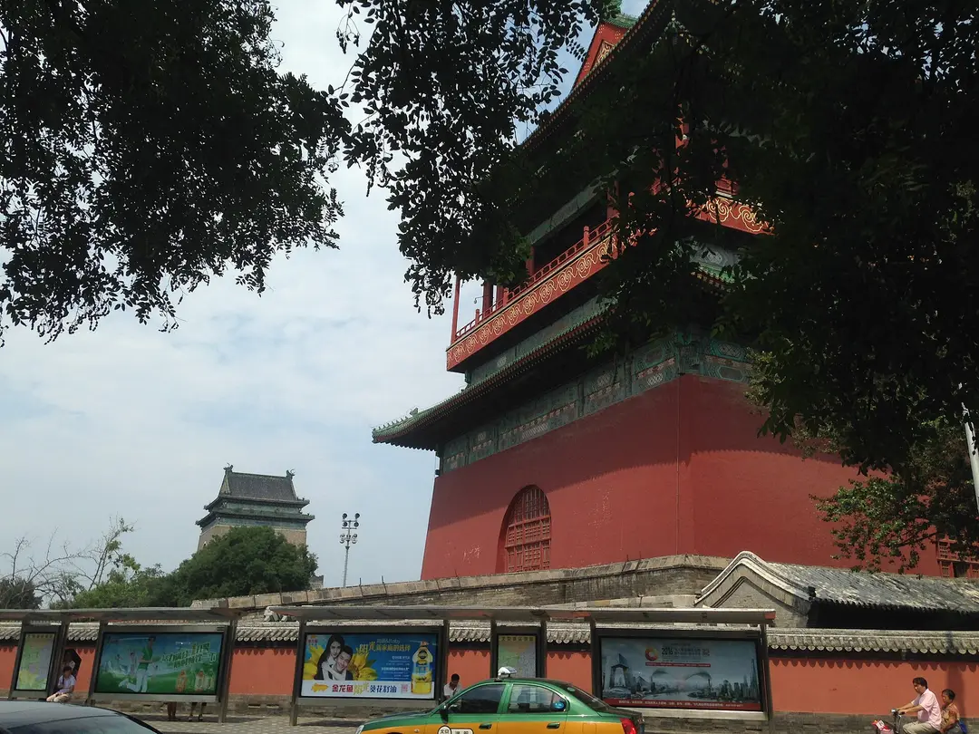 The red Drum Tower in the foreground with the grey Bell Tower visible beyond it