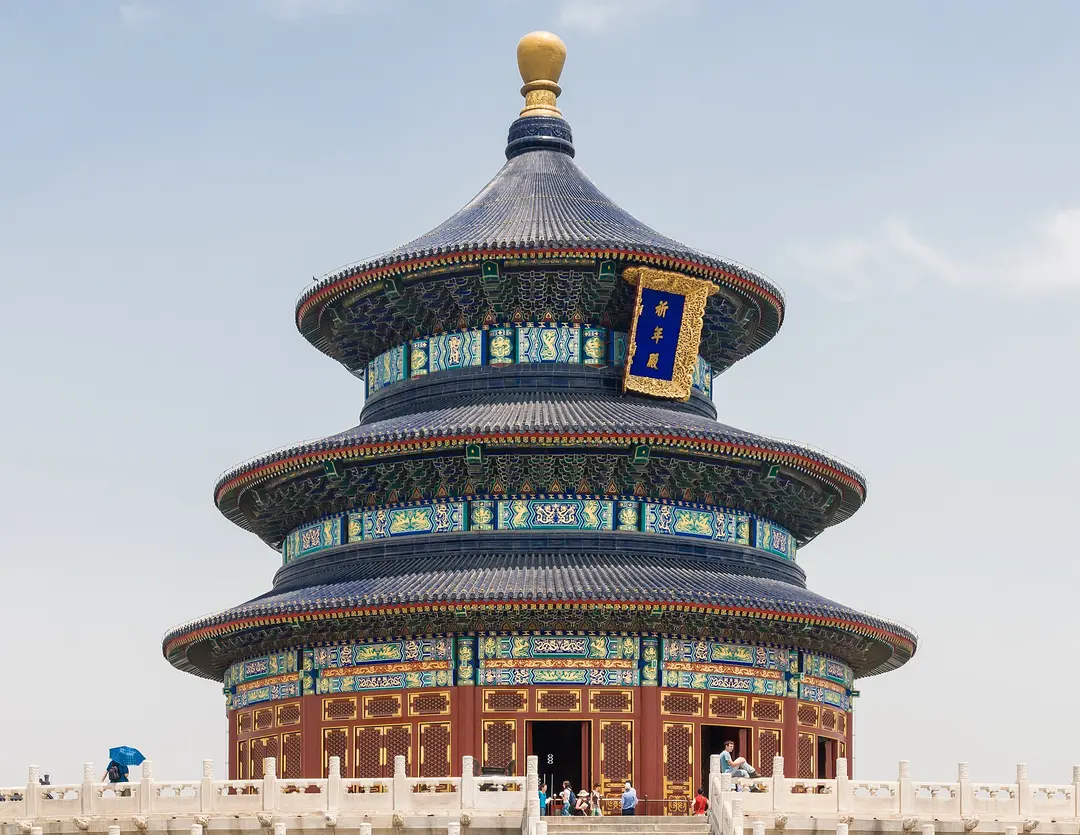 The round Hall of Prayer for Good Harvests at the Temple of Heaven against a pale blue sky
